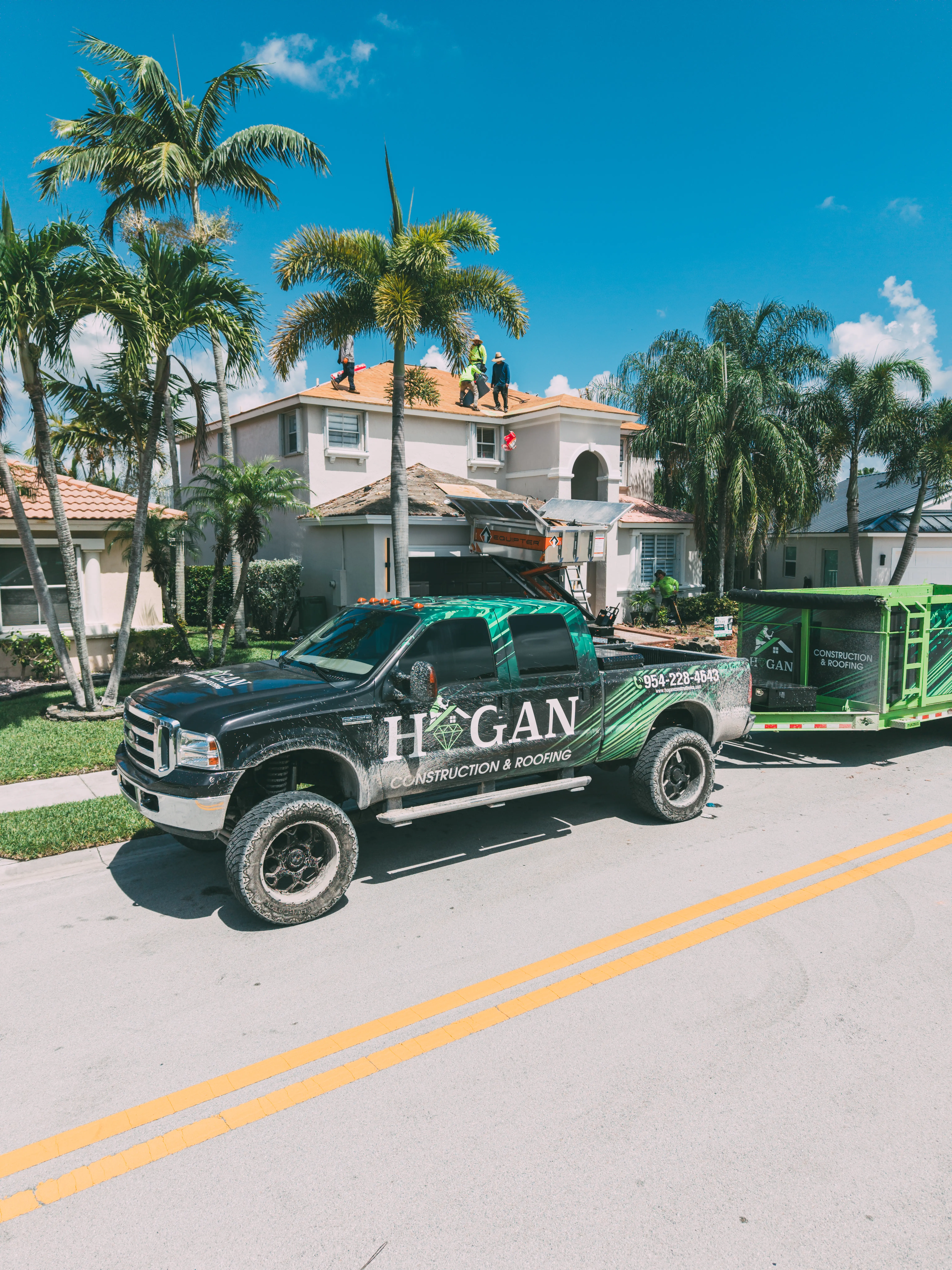 Hogan crew installing roofing underlayment on a Miramar home